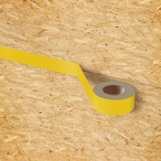 Image 3D d'un adhésif jaune appliqué sur un panneau de bois