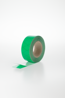 Photo d'un rouleau d'adhésif vert